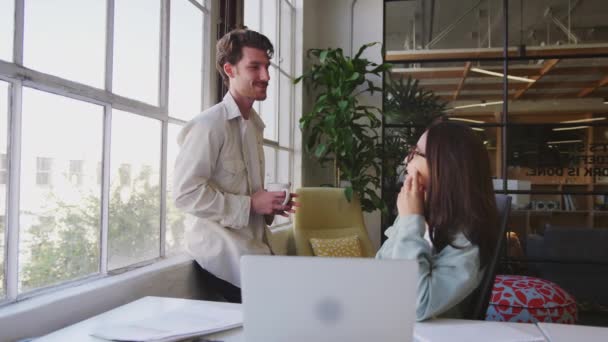 Two Young Creative Colleagues Taking Break Talking Together Office Close — Stock Video