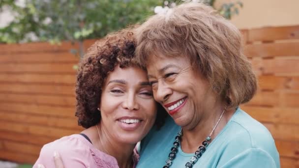 Senior Black Mum Her Middle Aged Daughter Smile Camera Embracing — Stock Video