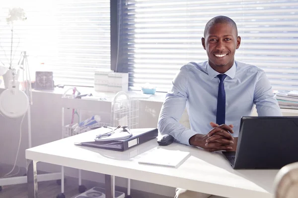 Portrait Smiling Male Doctor Sitting Desk Office — Stock Photo, Image