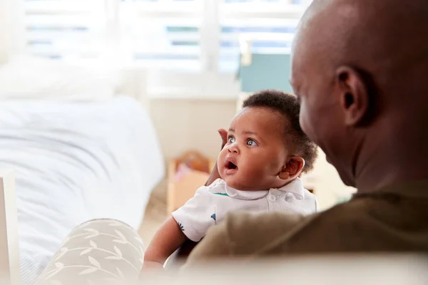 Proud Father Cuddling Baby Son Nursery Home — Stock Photo, Image