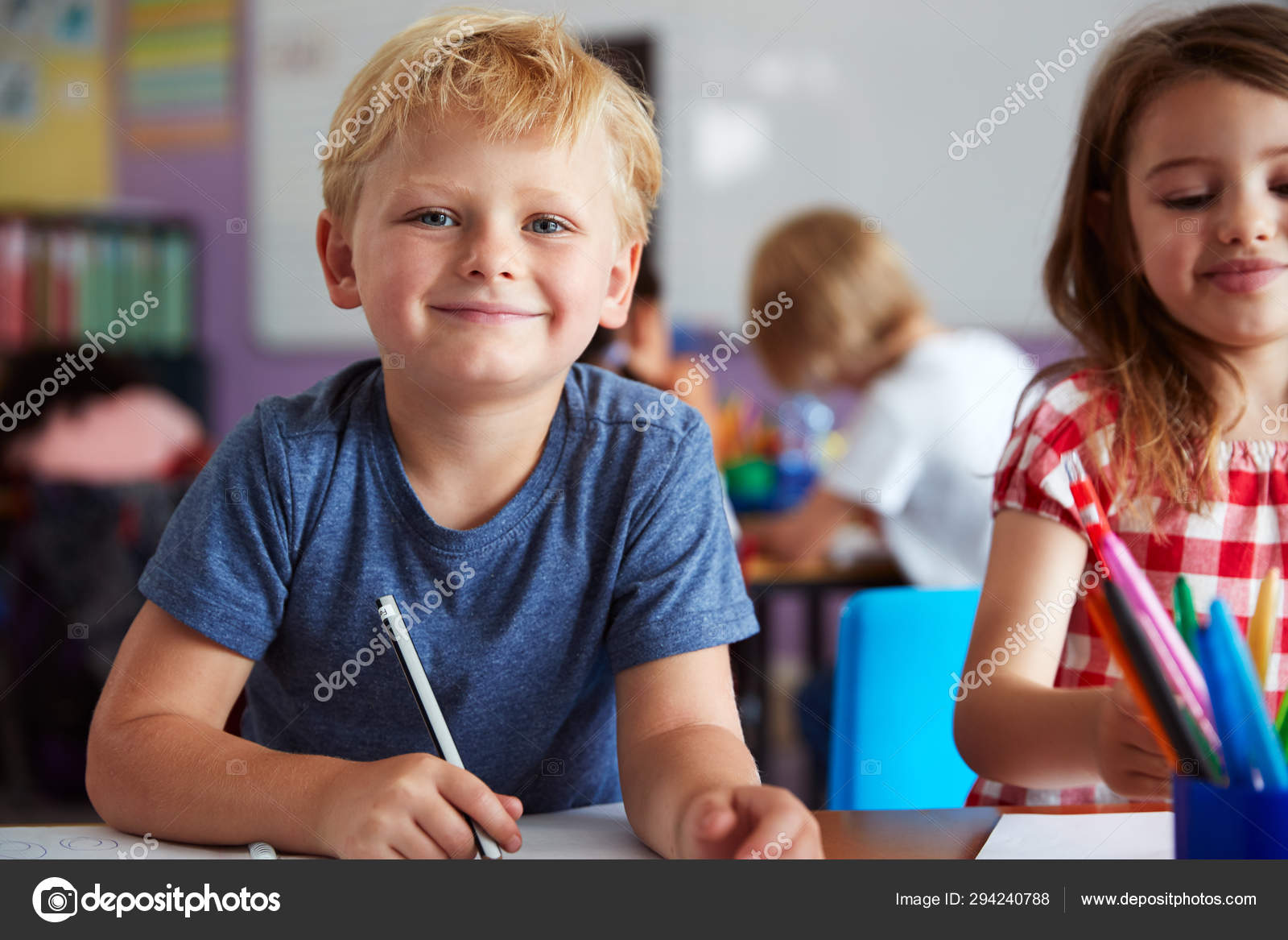 Portrait Male Female Elementary School Pupils Working Desk Stock