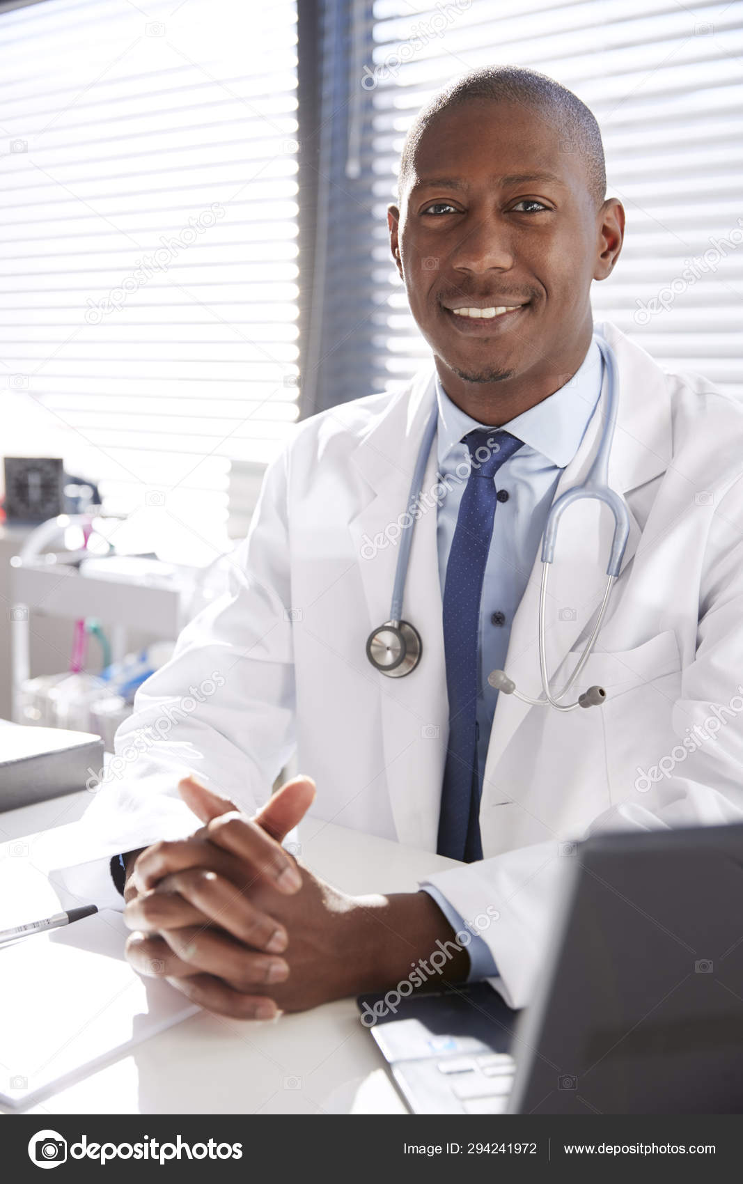 Portrait Smiling Male Doctor Wearing White Coat Stethoscope Sitting ...
