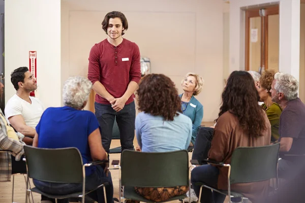 Man Standing Address Self Help Therapy Group Meeting Community Center — Stock Photo, Image