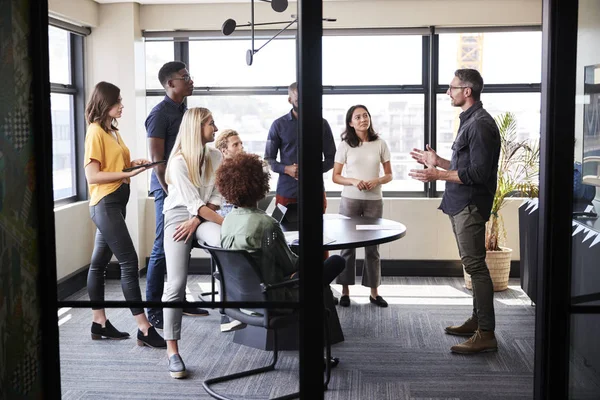 Creative Business Team Meeting Room Listening Informal Presentation Seen Doorway — Stock Photo, Image