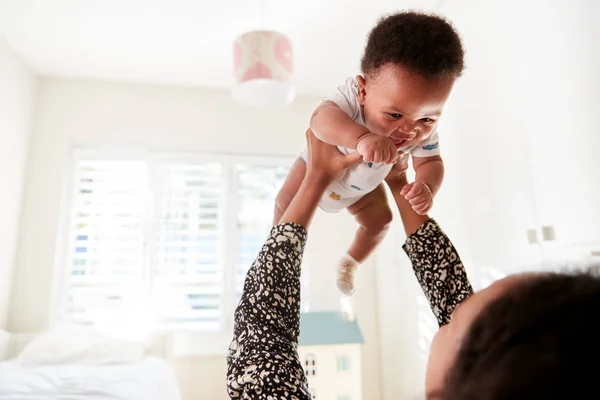 Proud Mother Cuddling Baby Son Nursery Home — Stock Photo, Image