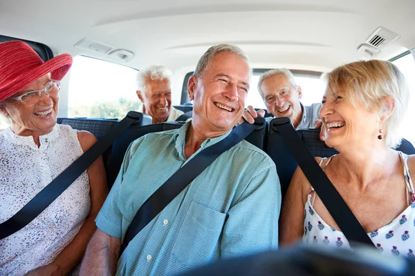 Group Senior Friends Sitting Back Van Being Driven Vacation — Stock Photo, Image