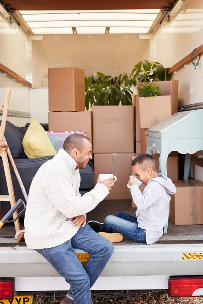 Father Son Sitting Tailgate Removal Truck Having Drink Moving Day — Stock Photo, Image