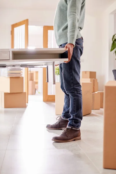 Close Couple New Home Moving Day Carrying Table Together — Stock Photo, Image