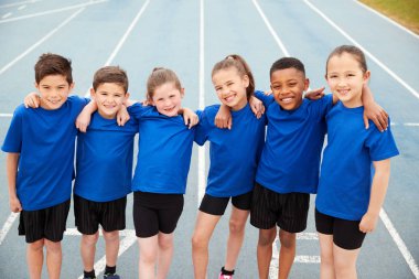 Portrait Of Children In Athletics Team On Track On Sports Day clipart