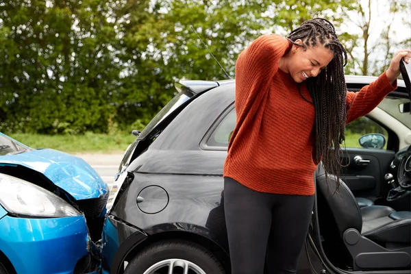 Female Motorist Whiplash Injury Car Crash Getting Out Vehicle — Stock Photo, Image