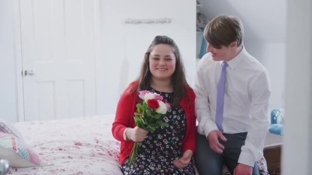 Young Downs Syndrome Couple Ready Out Date Man Giving Woman — Stock Video