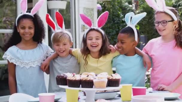 Portrait Children Wearing Bunny Ears Standing Table Outdoors Enjoying Easter — Stock Video