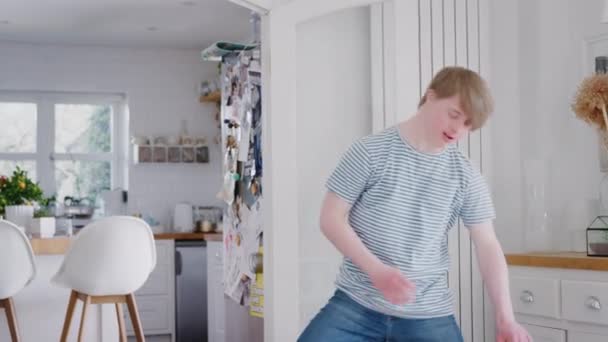 Young Downs Syndrome Man Having Fun Dancing Home Shot Slow — Stock Video