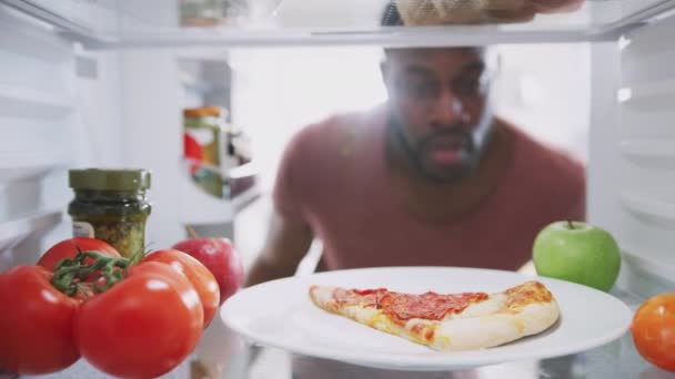 View Fridge Man Opens Door Picking Taking Bite Unhealthy Takeaway — Stock Video