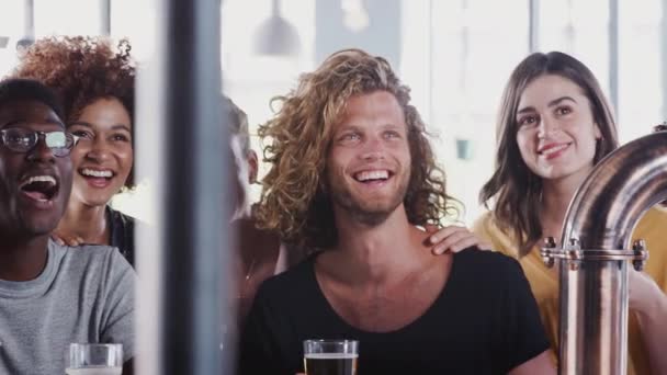 Group Friends Drinking Beer Watching Sports Event Bar Celebrating Shot — Stock Video