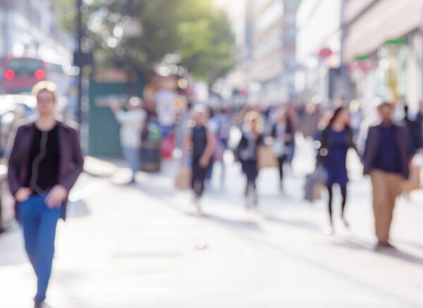 people in bokeh, street of London