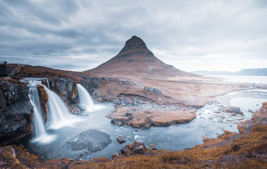 Kirkjufellsfoss Waterfall and Kirkjufell mountain