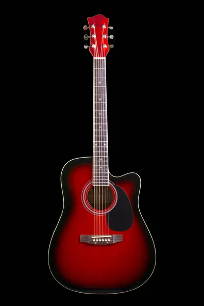 Acoustic guitar red, isolated on black background stylish art Spanish musical instrument six-string, classic, school game. Stock Picture