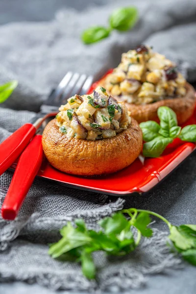 Baked mushrooms with vegetable stuffing.