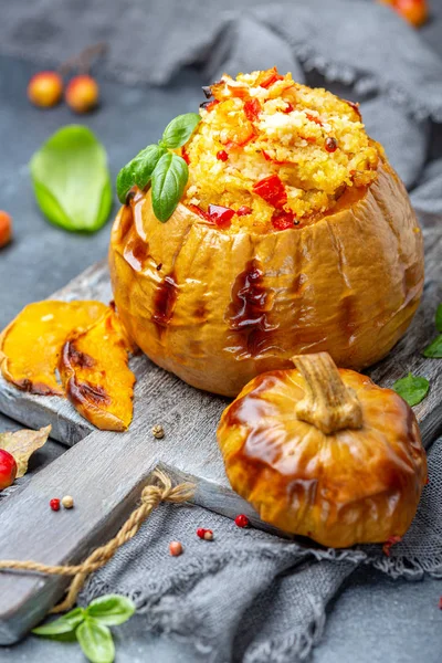 Delicious pumpkin baked with couscous.