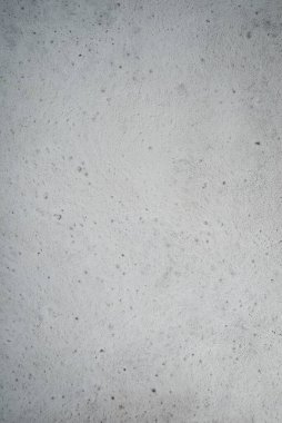 Beton bir yapı şeklinde gri bir arkaplan. Tasarımın temeli
