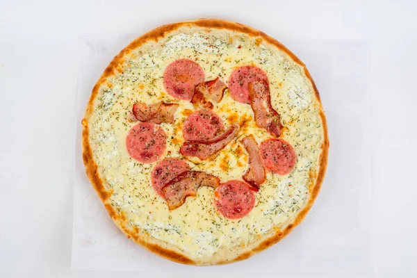 Tortilla with bacon, cheese filmed on a white background. Close-up shot