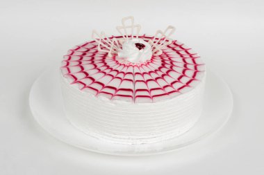 Beyaz karede kutlama pastası. Beyaz karede yakın plan.