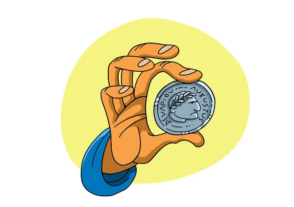 Hand hält römische Münze mit Bild des Kaisers Stockbild