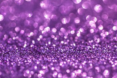 Pulların arka planı. Sequins arka planda. Pembe parlak arka plan. Parlayan ışıkları olan soyut, şen şakrak bir arka plan. Kumaş parlak renklerle parıldıyor. Moda kumaşları. 