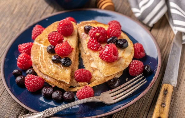 Sliced Sweet Homemade Pancakes Raspberries Blueberries Blue Plate Dark Wooden — Stock Photo, Image
