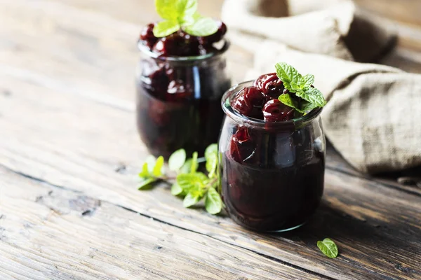 Two Jars Homemade Cherry Preserve Wooden Table Selective Focus — Stock Photo, Image