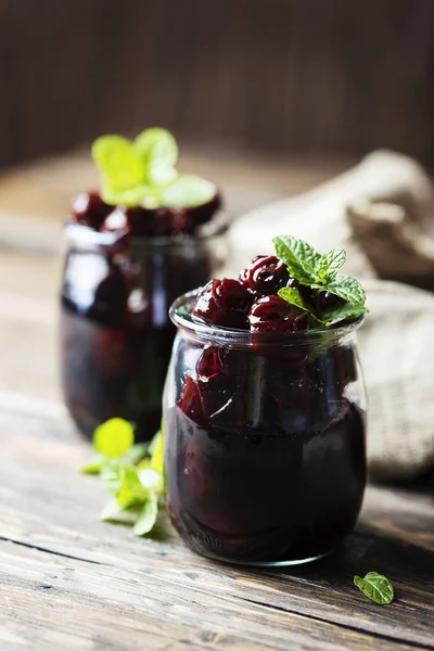 Two Jars Homemade Cherry Preserve Wooden Table Selective Focus — Stock Photo, Image