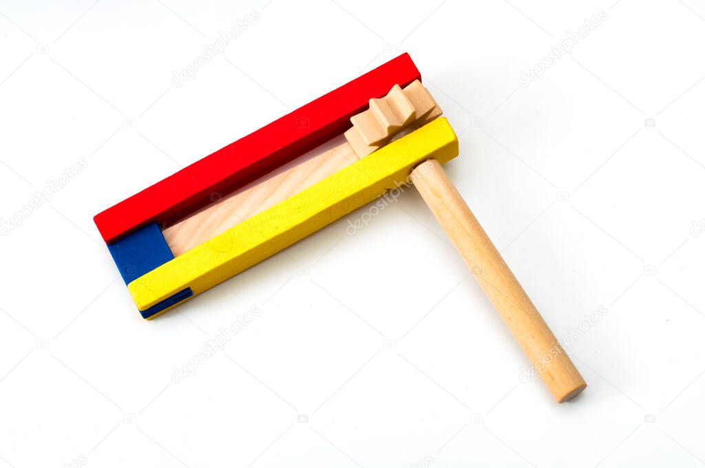 Judaism and religious holyday with wooden noisemaker or gragger (a traditional toy) for purim celebration holiday (jewish holiday)