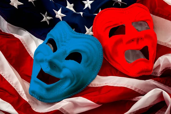 Politics is just a theater, partisan politicians and hyper partisanship concept theme  with comedy and tragedy masks on the american flag