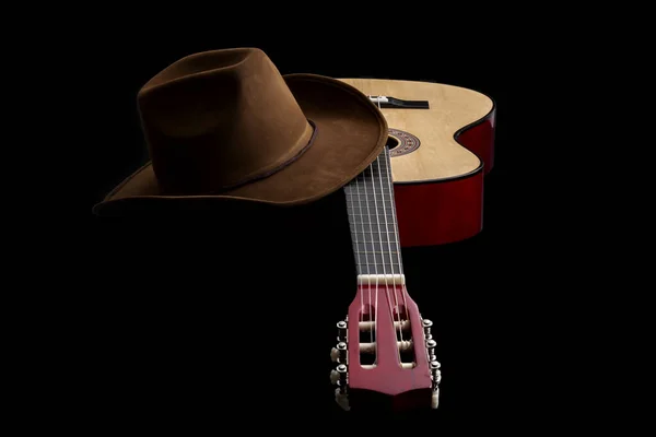 美国文化 民歌和乡村音乐概念主题 头戴牛仔帽 背景为黑色 背景为戏剧性灯光 — 图库照片