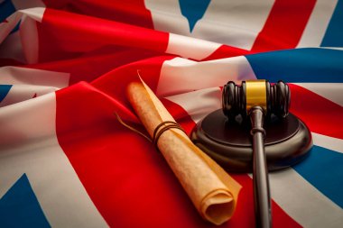 Union Jack, a gavel and the Magna Carta (a symbol for human rights, democracy and free speech) next to a gavel clipart