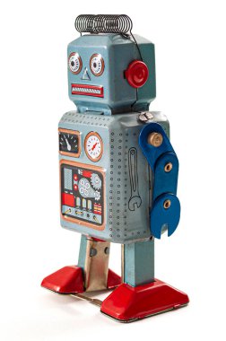 Geleceğe dair eski bilim kurgu görüşü, bilim kurgu nostaljisi ve beyaz arka planda izole edilmiş eski mavi metal robotlu antika bir oyuncak kavramsal fikri.
