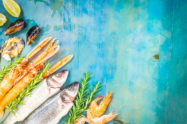 Fresh seafood on blue background — Stock Photo, Image