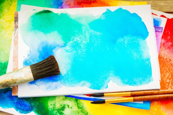 Canva with frame of paints and brushes — Stock Photo, Image