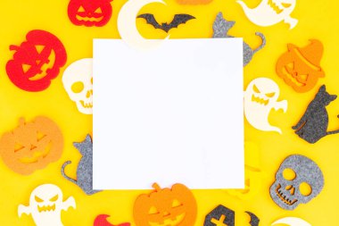 Turuncu arka planda Cadılar Bayramı sahnesi