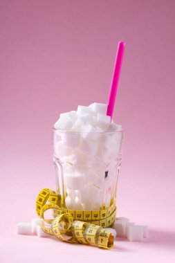 Sugar on pink background clipart