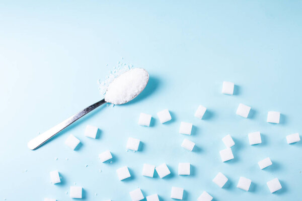 Sugar on blue background