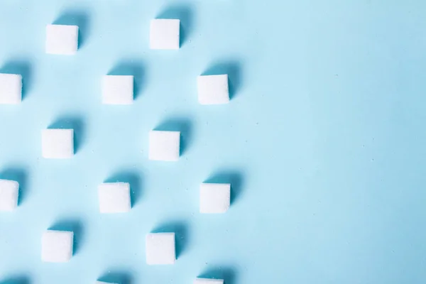 Цукрові Кубики Регулюють Візерунок Синьому Фоні Плоска Сцена Простором Копіювання — стокове фото