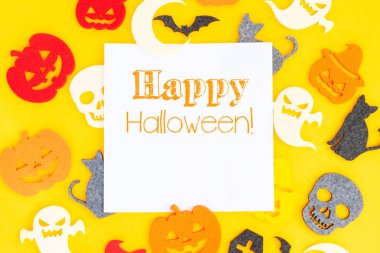 Turuncu arka planda Cadılar Bayramı sahnesi