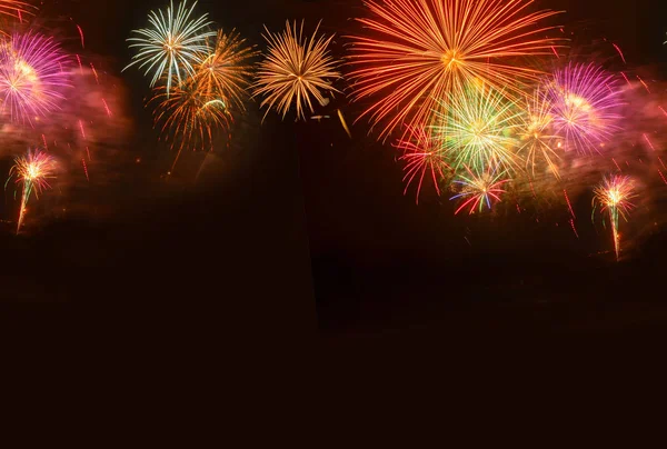 Fireworks explosions on black — Stock Photo, Image