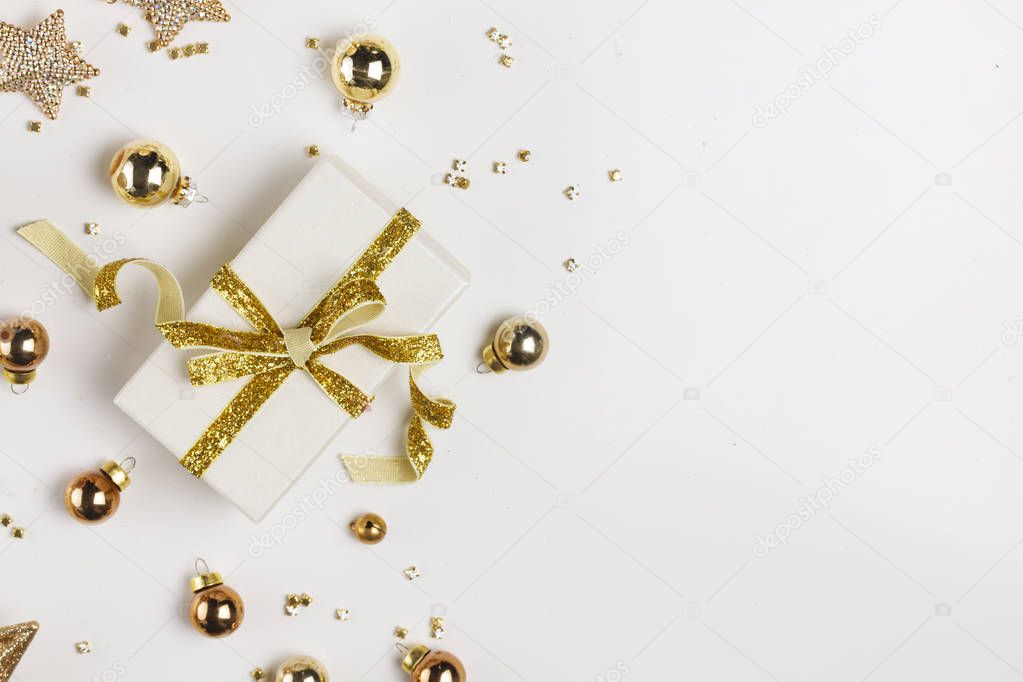 Christmas flat lay scene with golden decorations