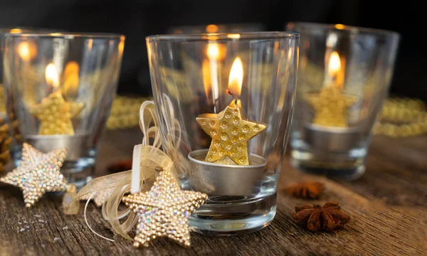 Glowing Christmas candles — Stock Photo, Image