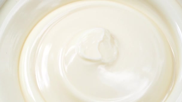 Swirl of cream in jar — Stock Video