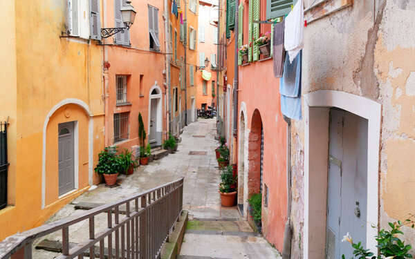 Cosy street in old town of Nice, France
