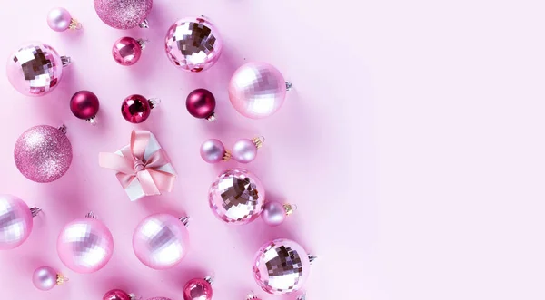 Christmas decorations on pink — Stock Photo, Image